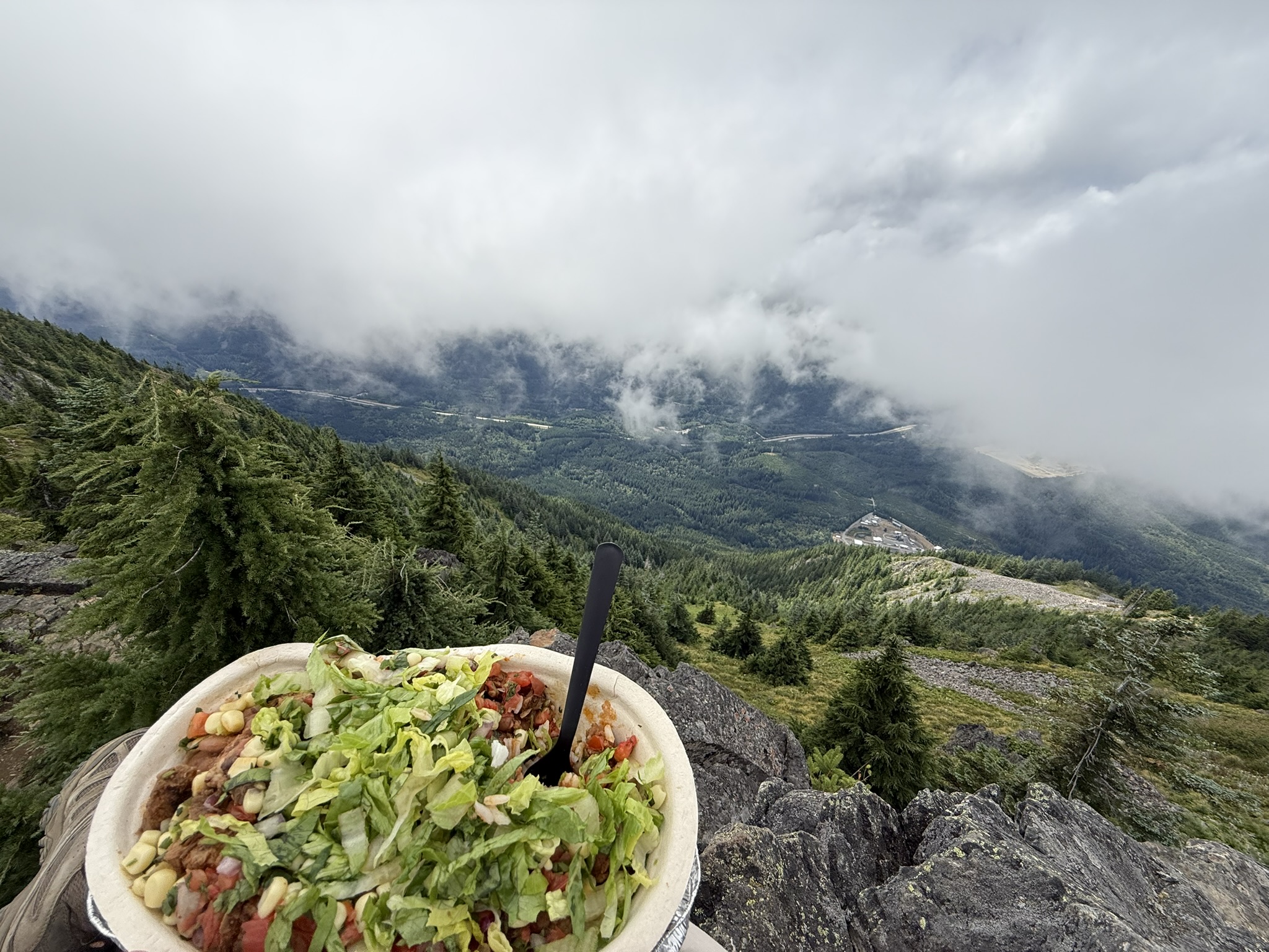 Chipotle bowl overlooking a foggy mountain valley